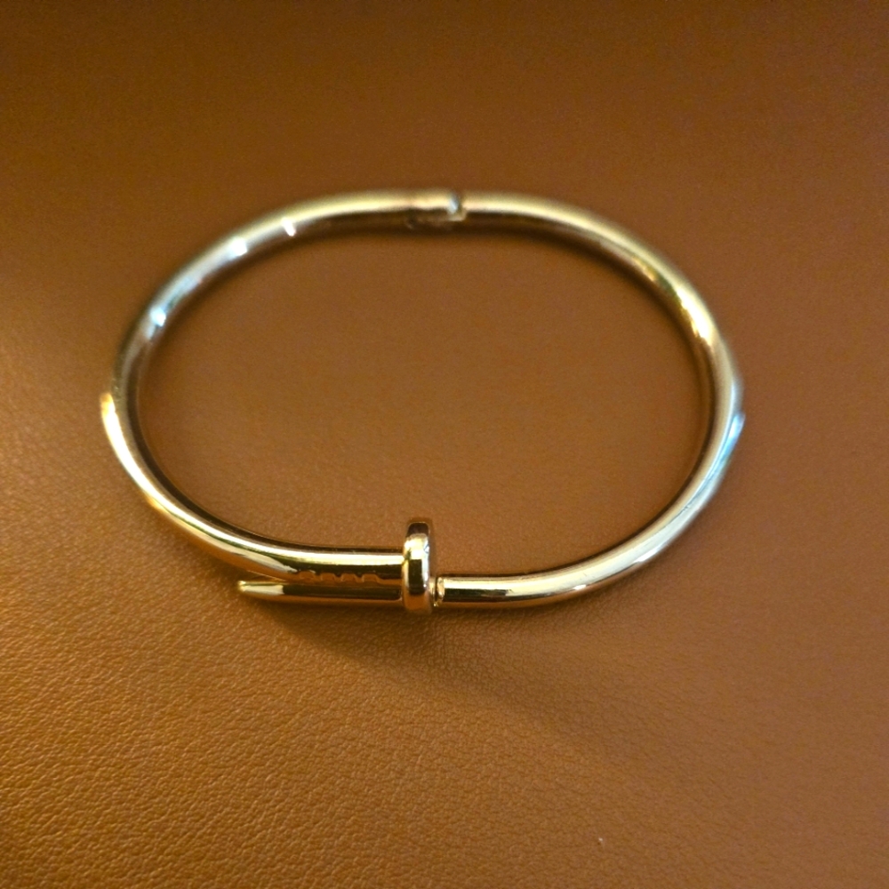 Goldtone nail cuff bracelet
